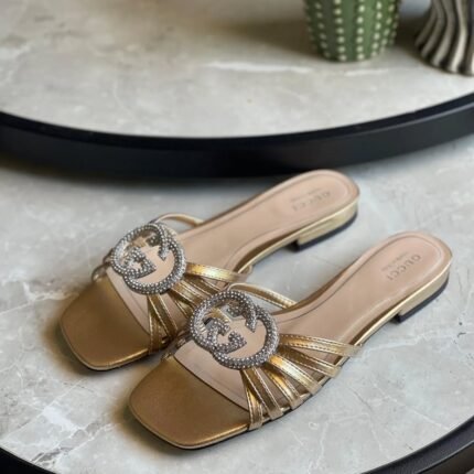 Gucci Women's Interlocking G Slide Sandals In Gold Metallic